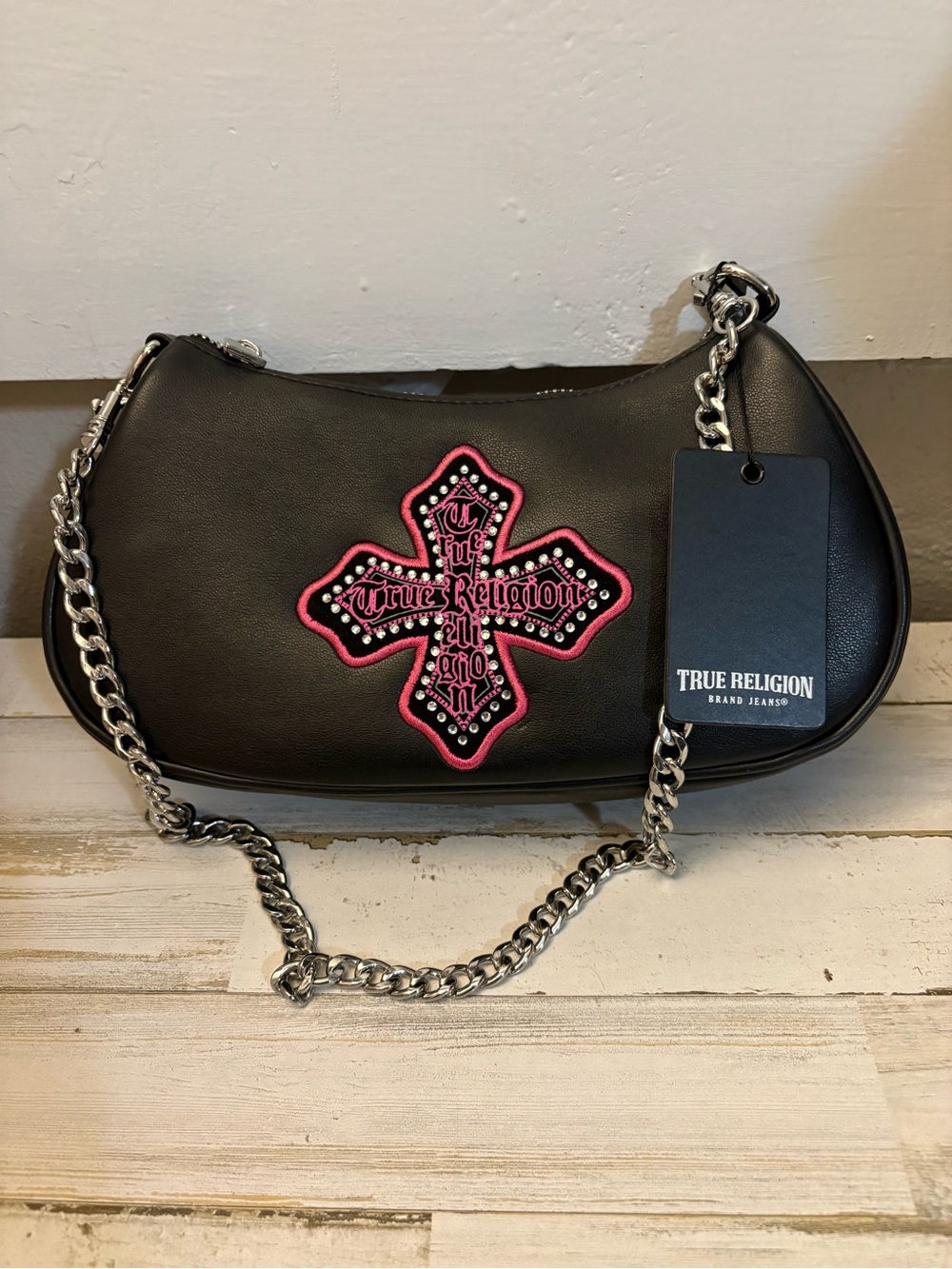 True Religion Black Shoulder Bag with Pink Cross Accent New With Tags